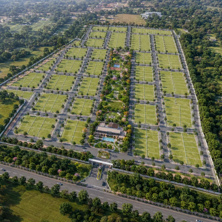 Address Maker Apollo landscaped internal avenues lined with residential plots across the tree-lined layout
